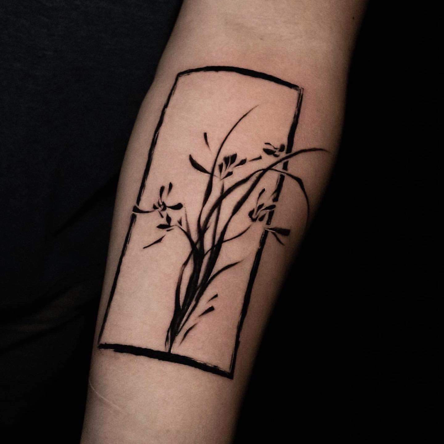 Abstract flower tattoo by