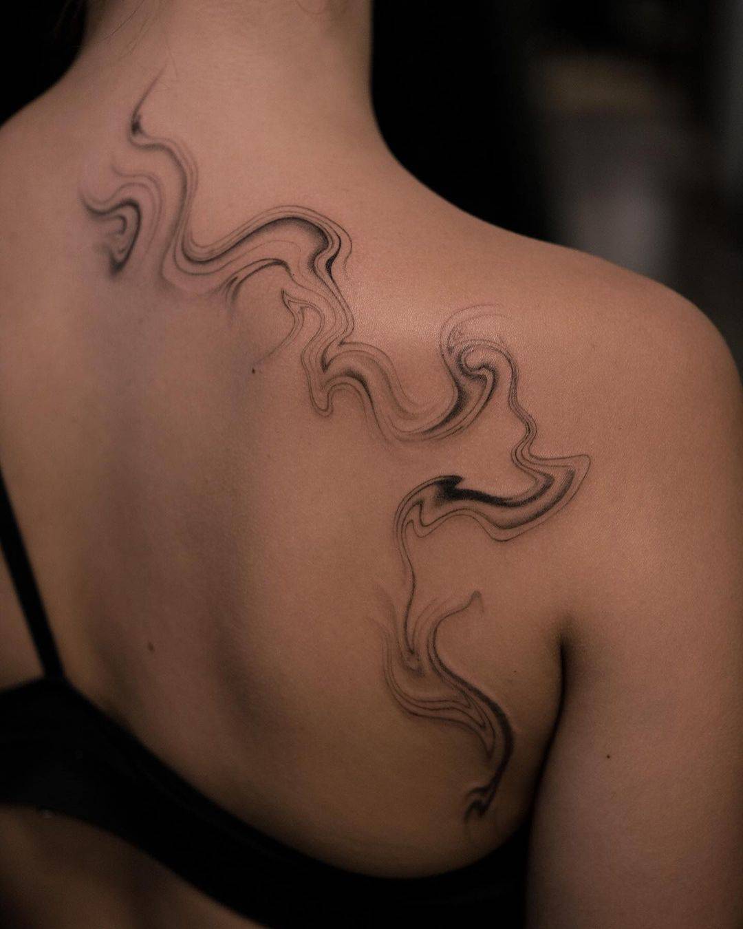 Abstract tattoo design on back by stateofmindink
