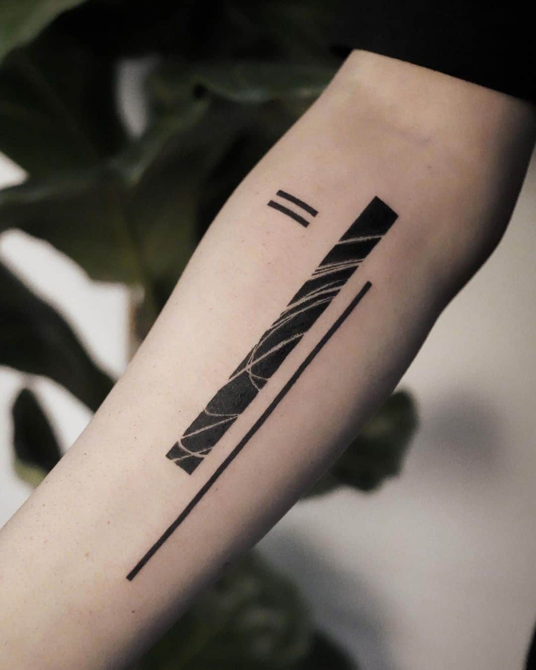 Abstract tattoo on arm by jamjam.tattoo