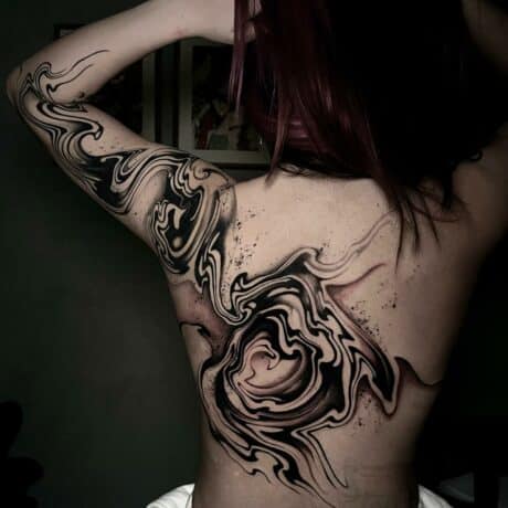 Amazing back abstract tattoo by p e s t e