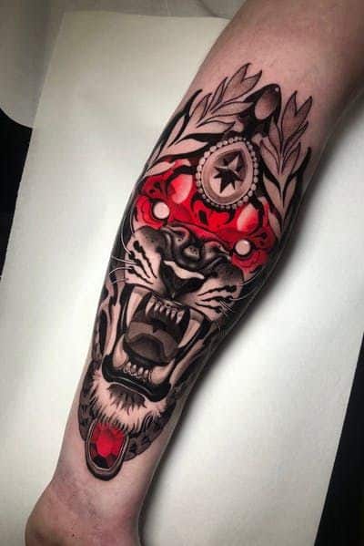 Amazing lion tattoo on forearm