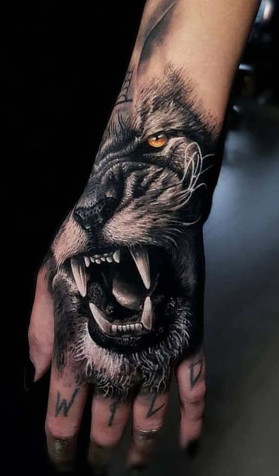 Amazing lion tattoo on hand