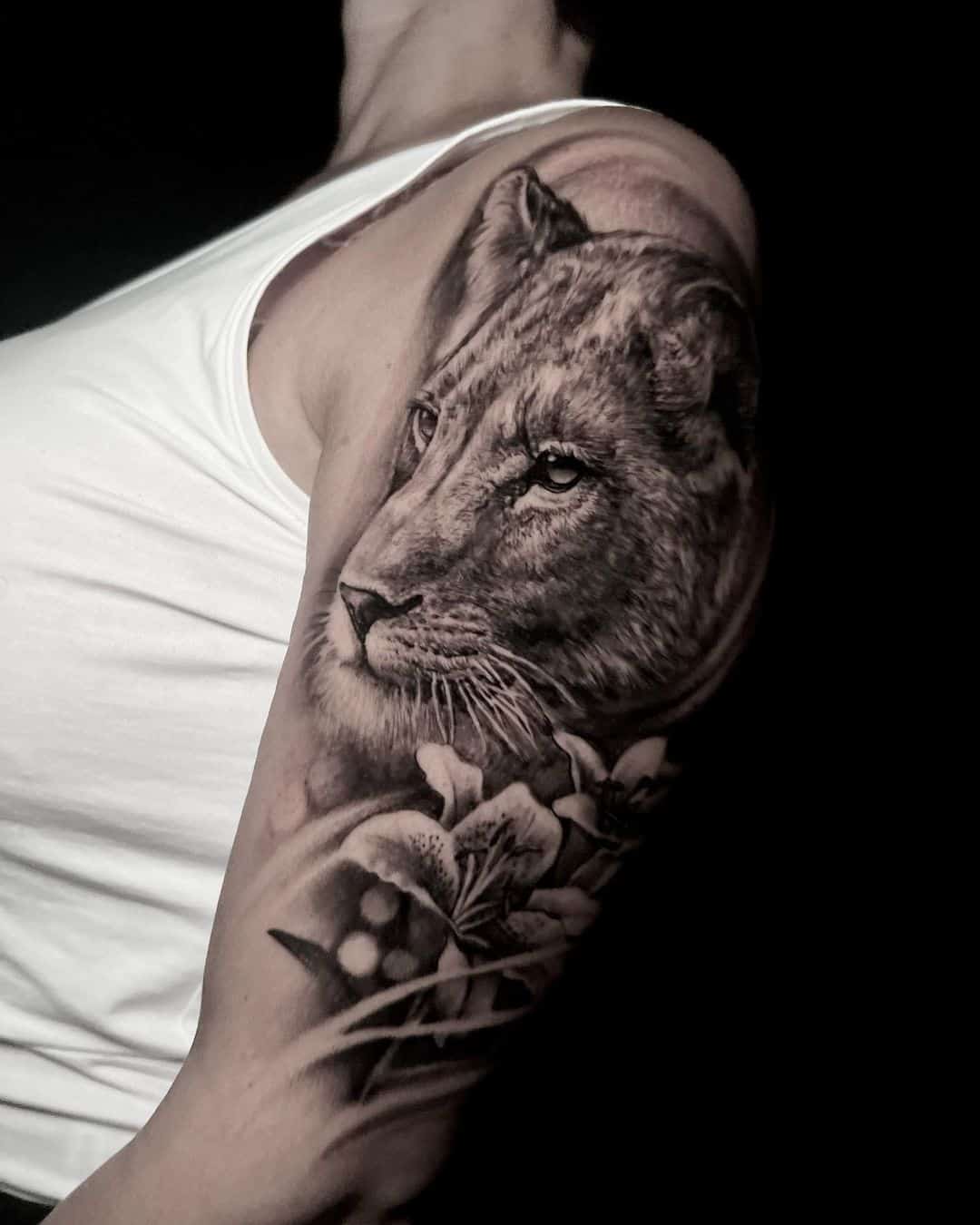 Amazing realistic lioness tattoo by perciastattoo