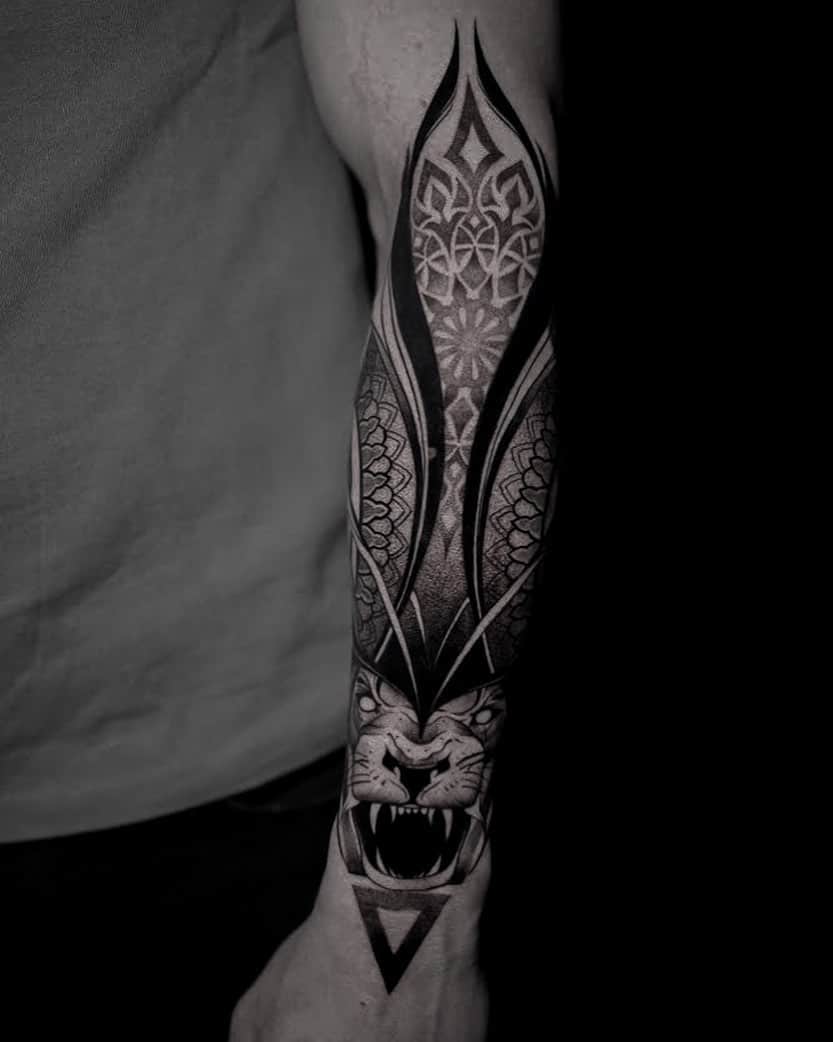 Amazing roring lion tattoo with mandala design by jhomaniec tattoo