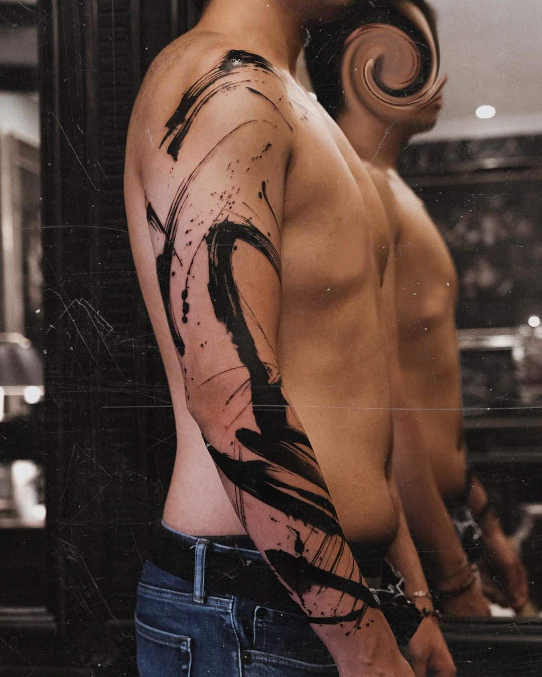 Beautiful abstract tattoo on arm by who is ryu