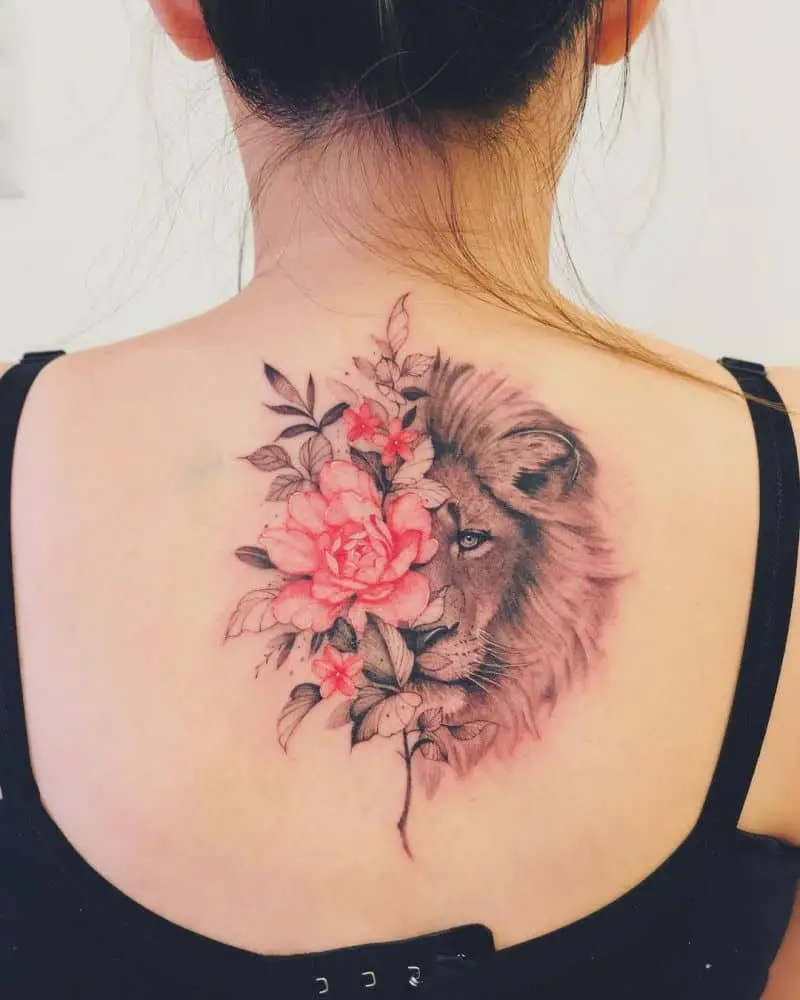 Beautiful lion face tattoo with flowers by @thankstattoo 23 on back 1