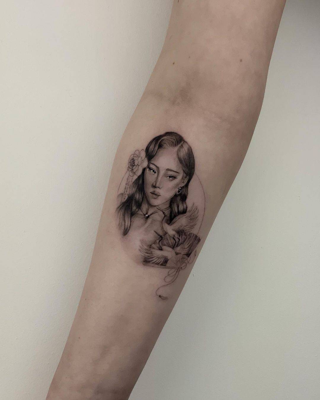 Beutiful women tattoo design on arm by janicetattdoo
