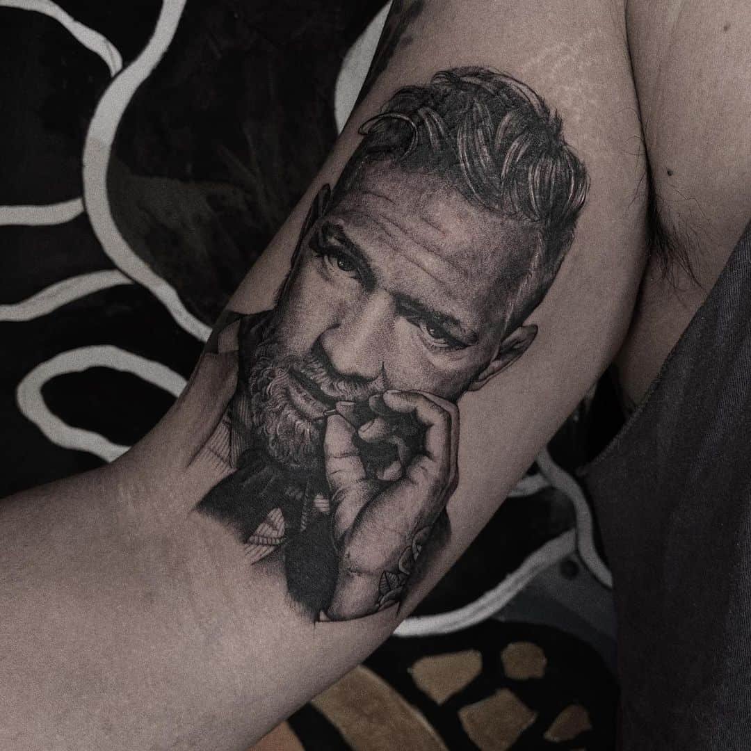 Conor portrait on arm by suni tattoo artist