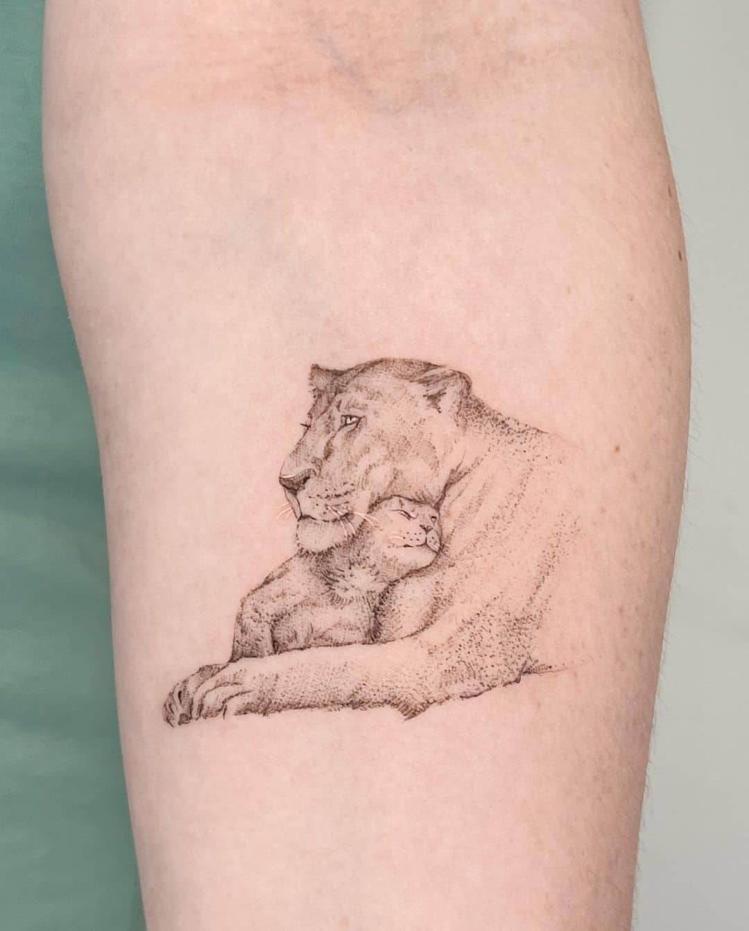Cub and lioness tattoo by izavisualiza