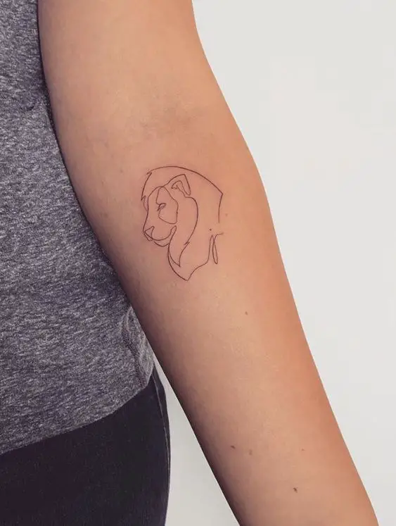 Fineline lion tattoo on arm