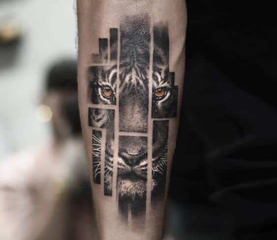 Geometric tiger portrait tattoo on arm
