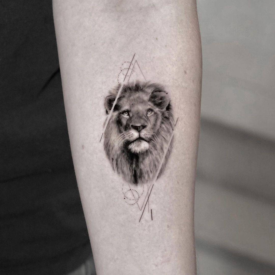 Lion face portrait tattoo by mafis tats