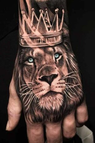 Lion with crown on hand
