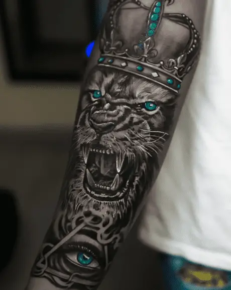 Lion with crown tattoo by