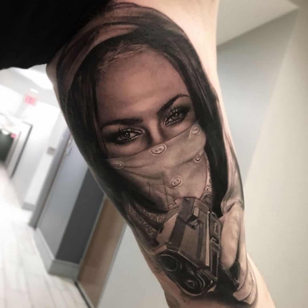 Megn ith mask and gun tattoo by iyanstattoo