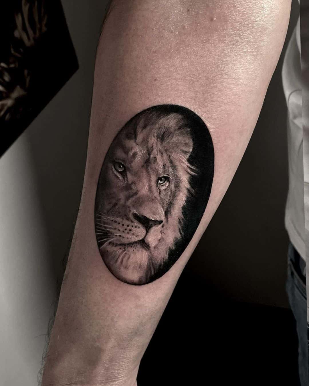 Simple realistic lion tattoo on forearm by cindy.tattoo