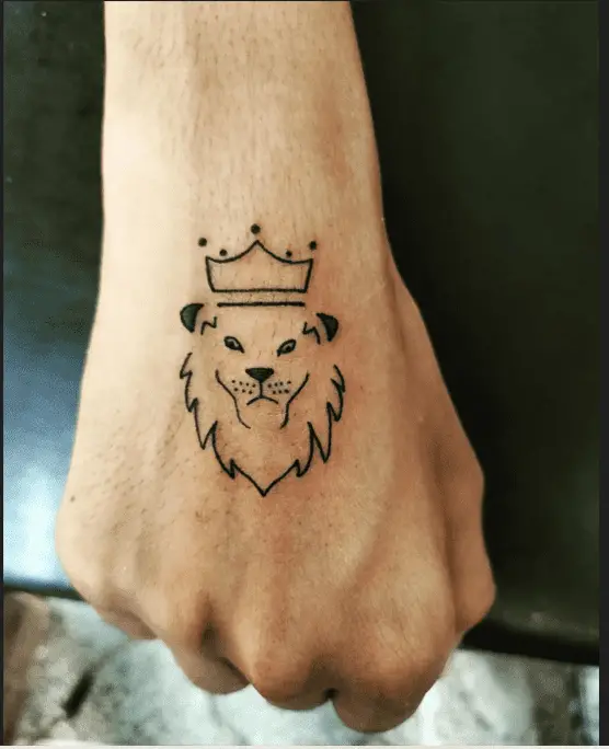 Small lion tattoo on hand