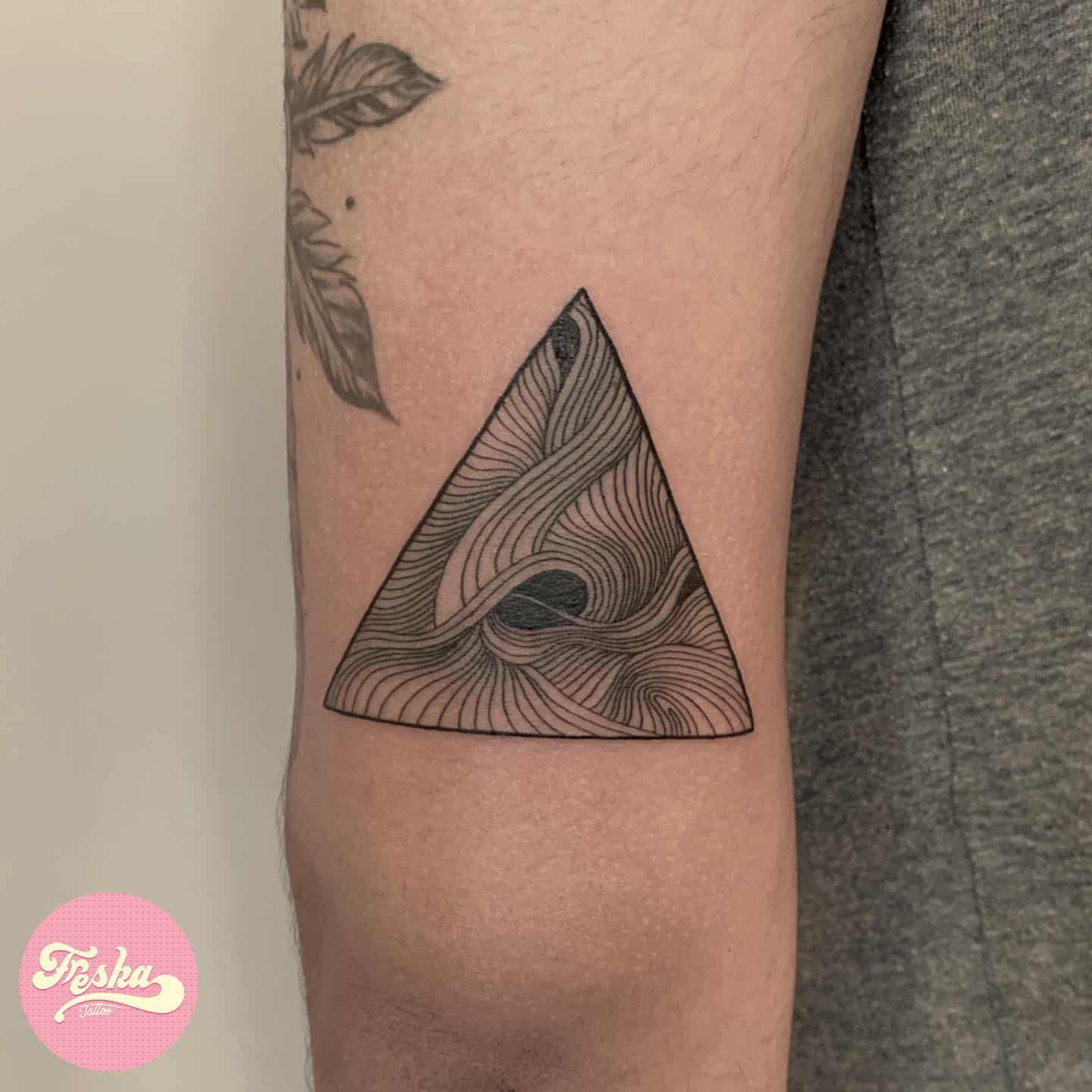 Triangle abstract tattoo by freska tattoo