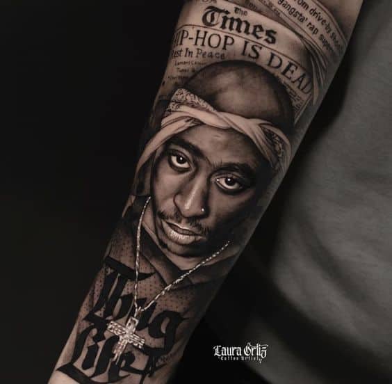 Tupacs face portrait tattoo
