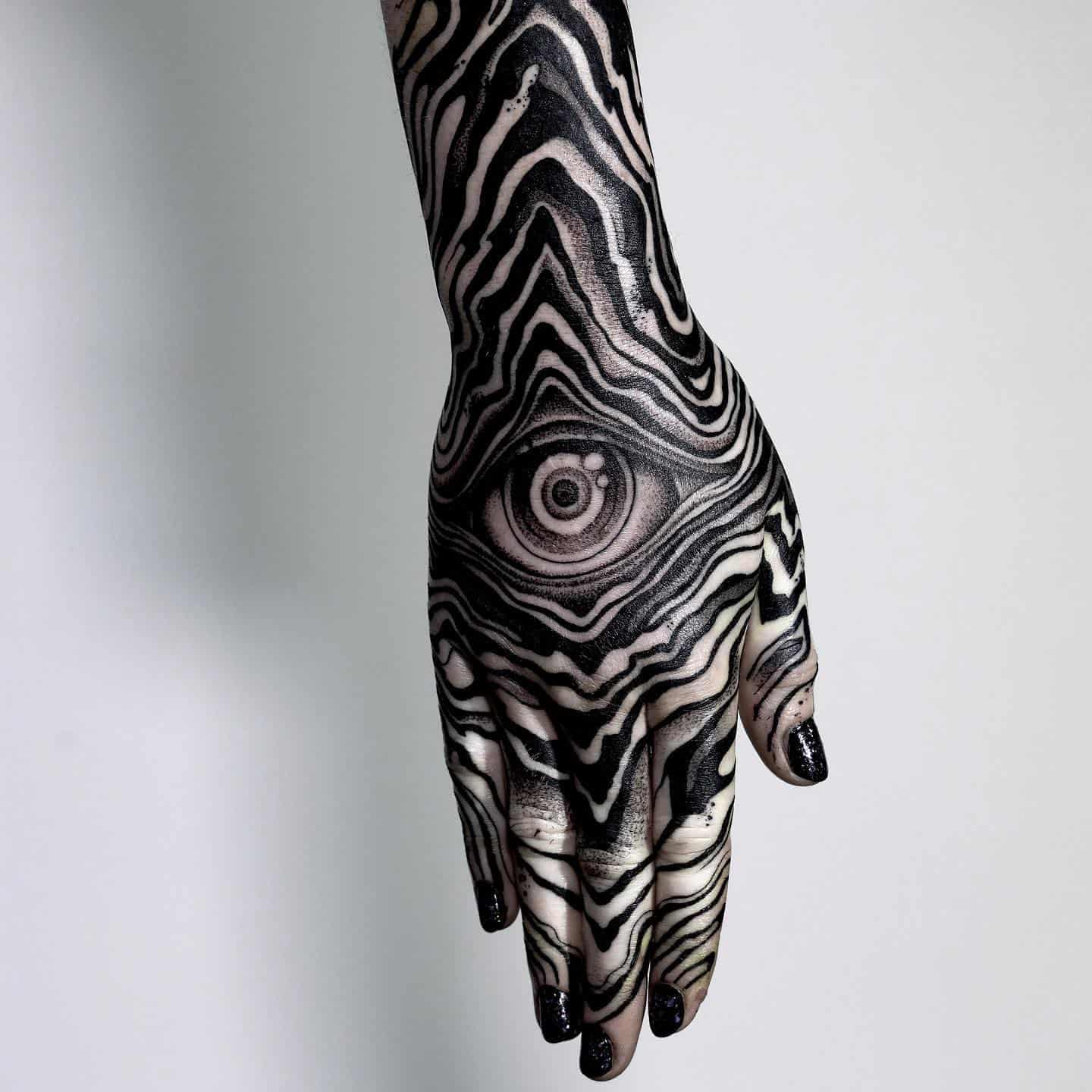 Unique abstract tattoo on hand by p e s t e