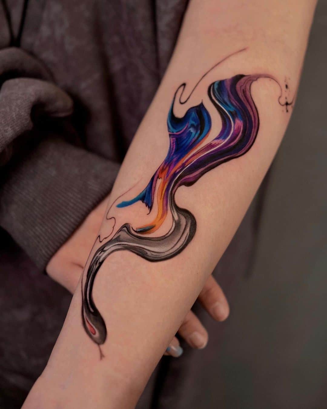 Watercolor abstract tattoo on arm by newtattoo demi