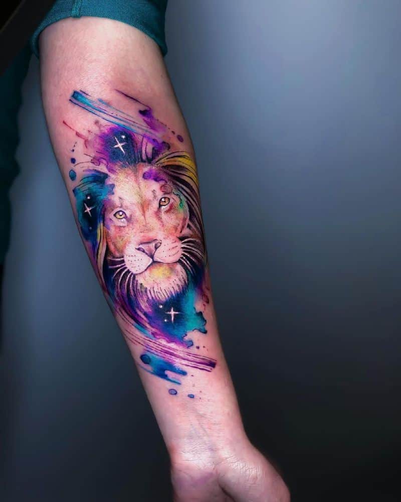 Watercolor lion tattoo on arm by sebastian enemy