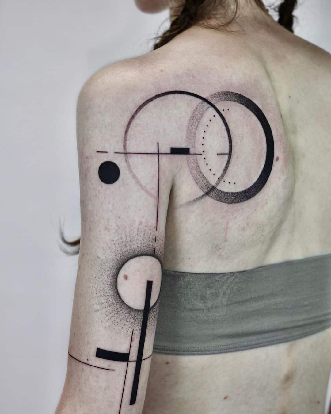 Wonderful geometric abstract tattoo on back by eleonora.cercato