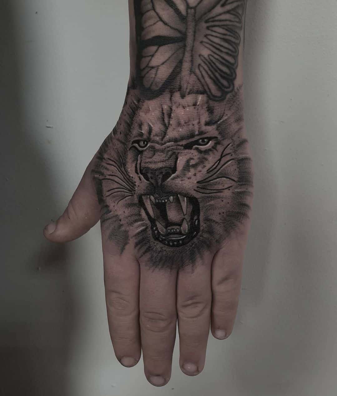 Wonderful roaring lion tattoo by jerzi ink