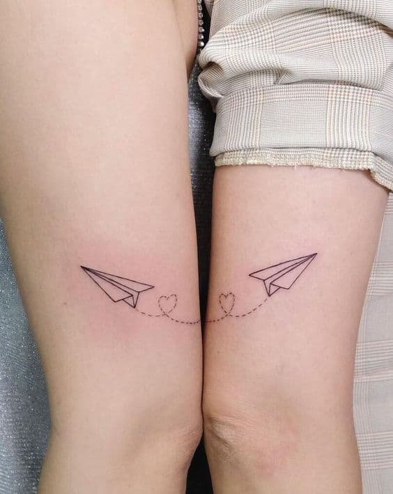 plane matching tattoos