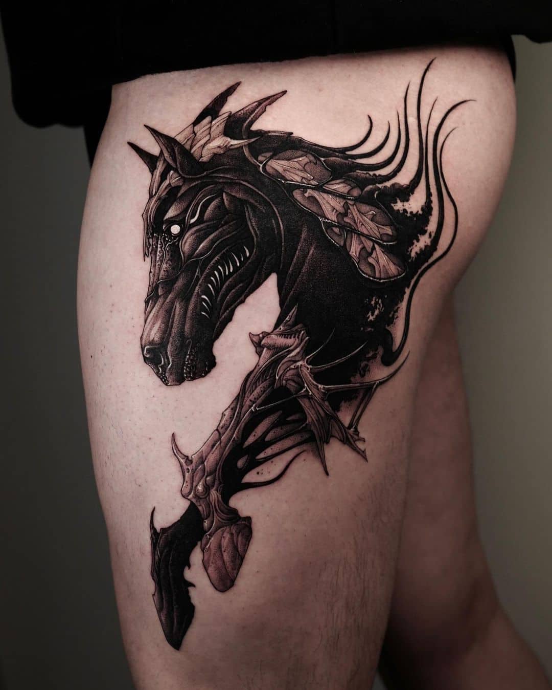 Abstract horse tattoo on thigh by 47volt