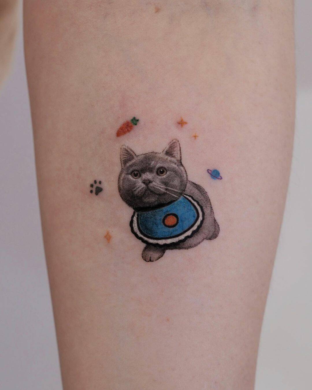 Amazing cat tattoo by hoze tattoo