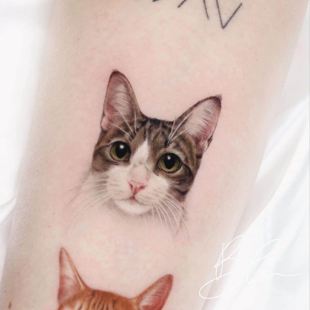 Amazing cat tattoo design by blu.tattoo