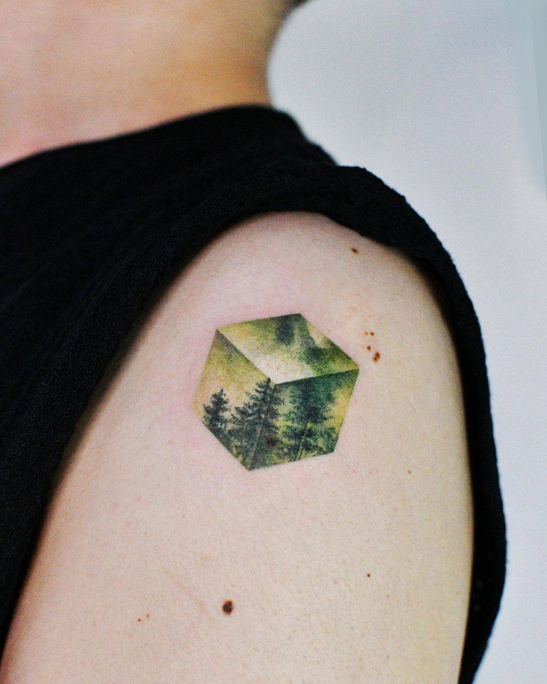 Amazing cube design forest tattoo by thistle.tattoo