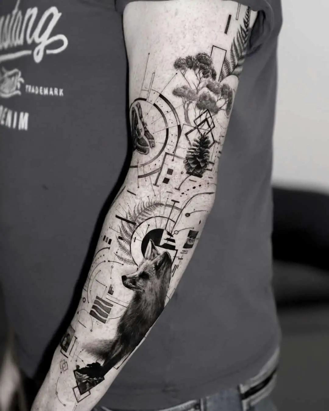 Amazing geometric fox tattoo on arm sleeve by tiago dot
