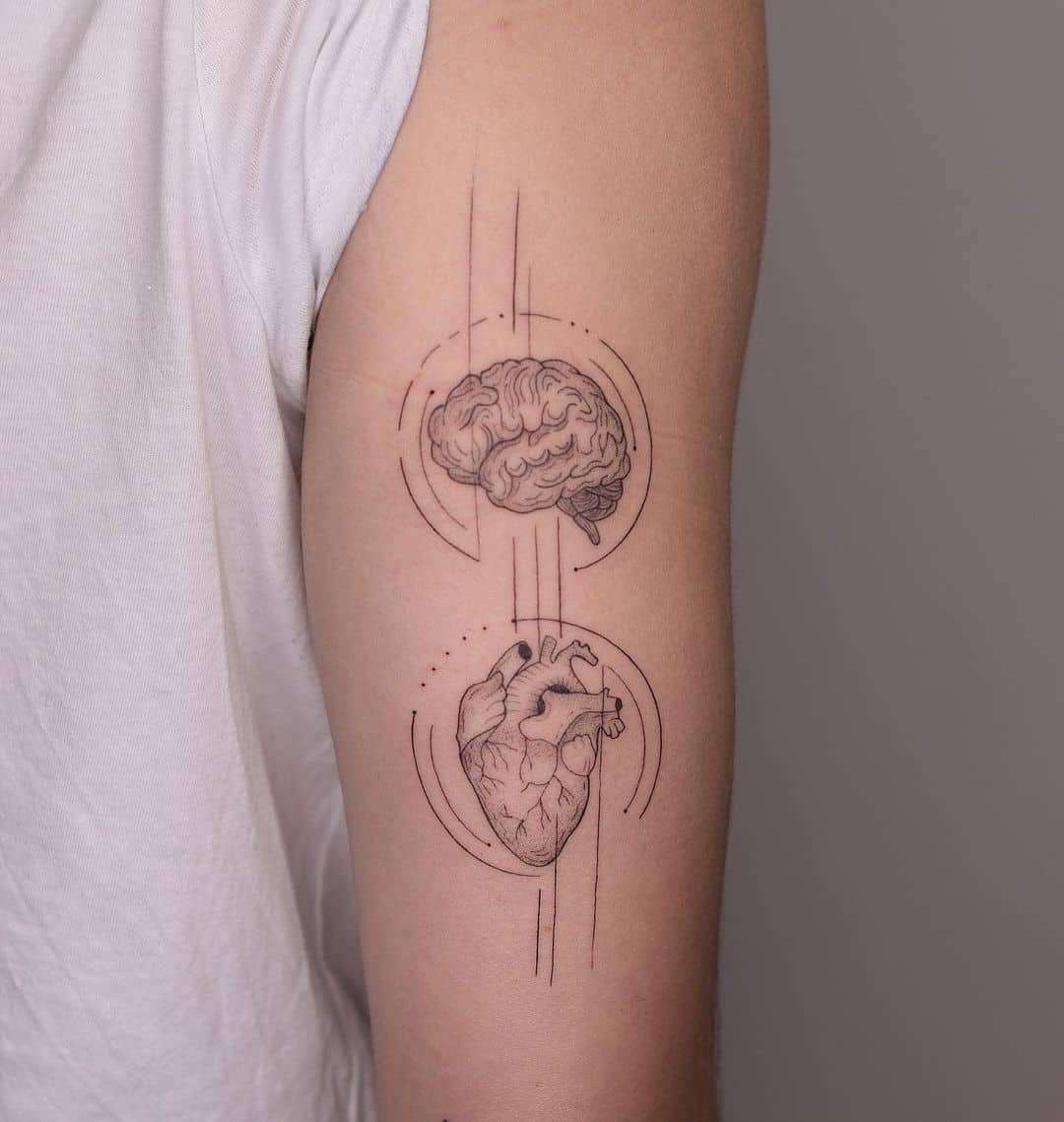 Amazing heart tattoo design with brain by ladyshenone