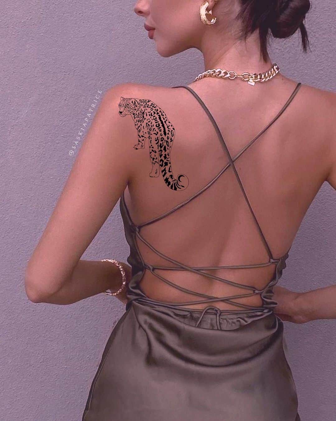 Amazing leopard tattoo on back by saskiapatrice