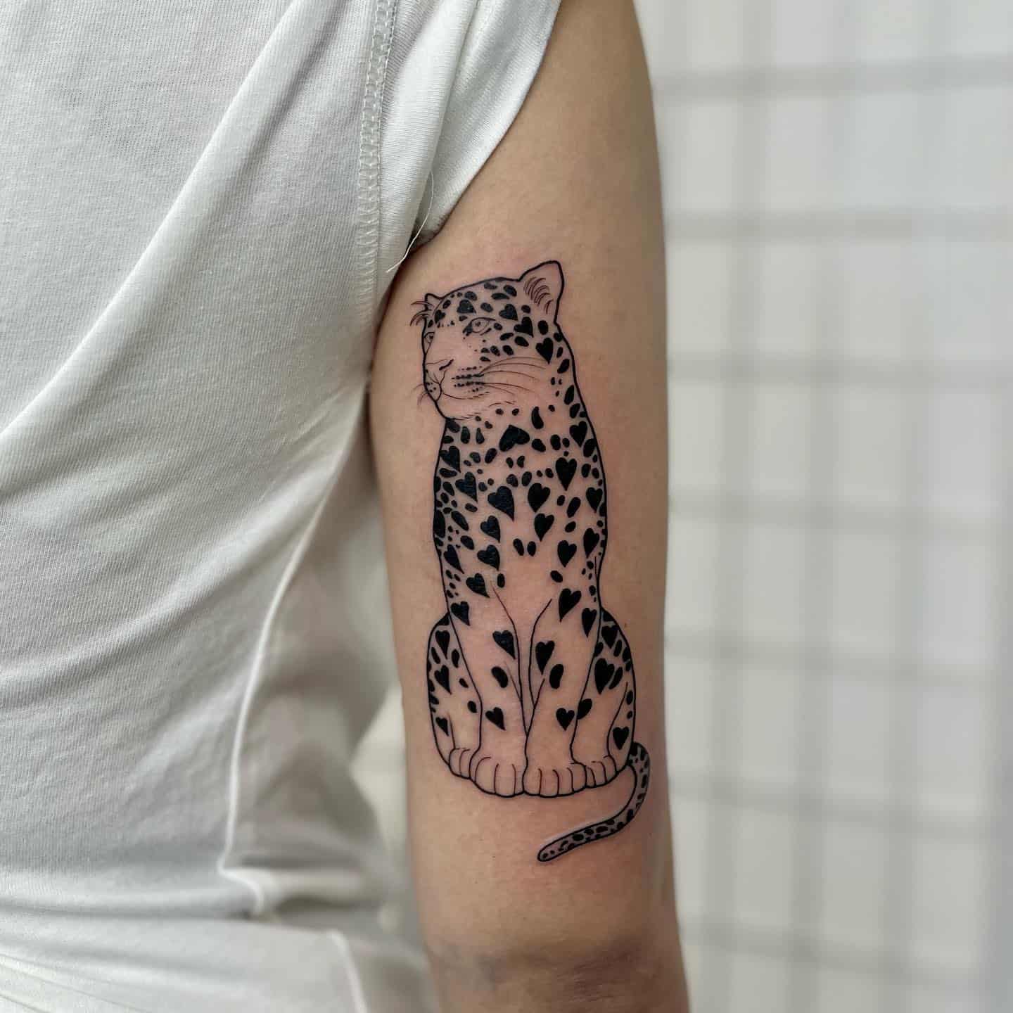 Amazing leoprd tattoo on arm by laurensmithtattoos