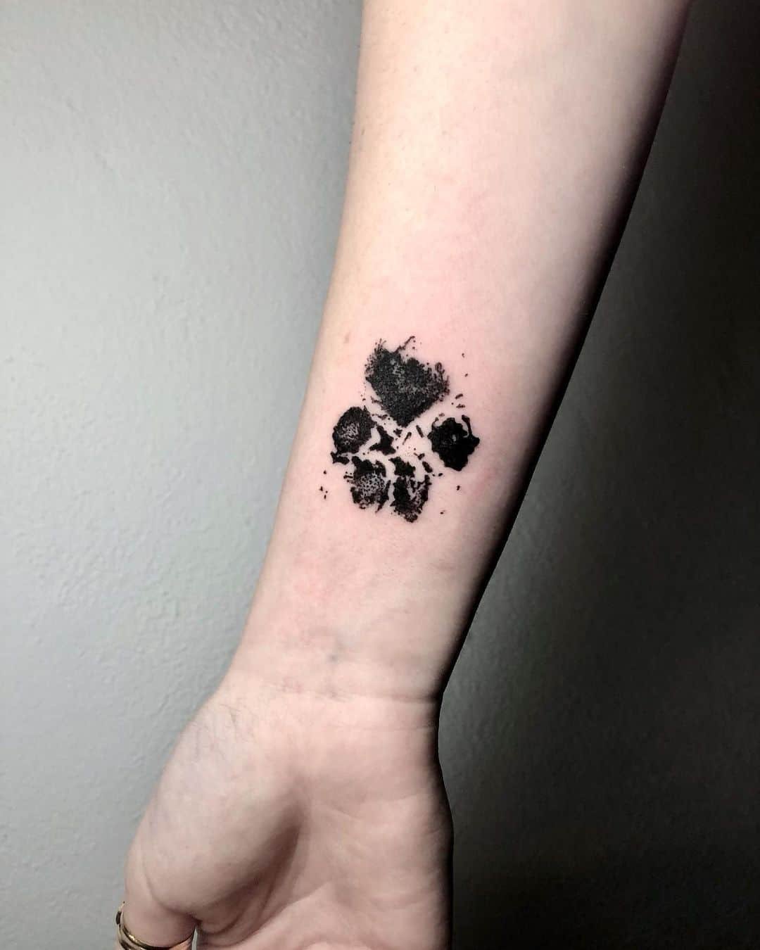 Amazing paw print tattoo by brem tattoo