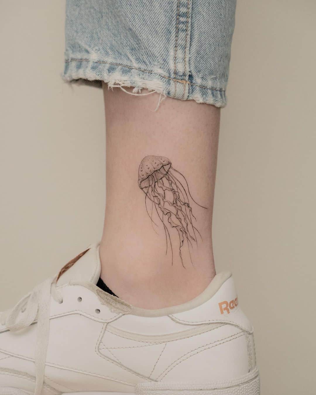 Beautiful and simple micro realism tattoo by jk.tattoo