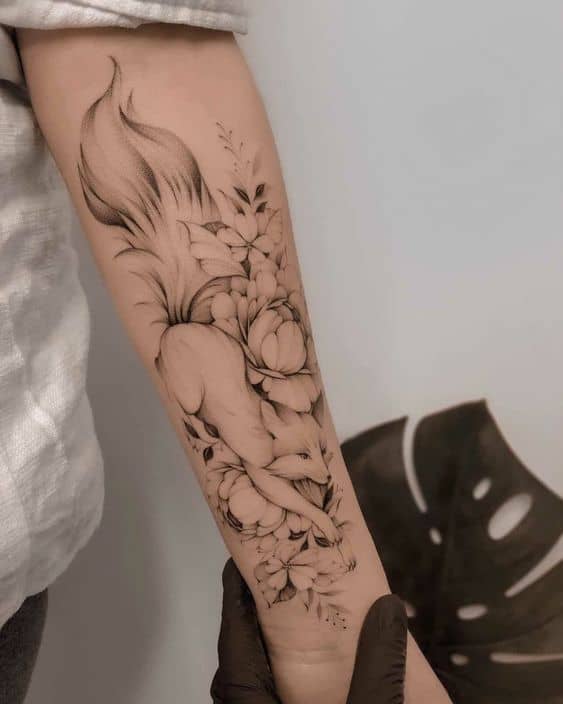Beautiful floral fox tatto on arm sleeve