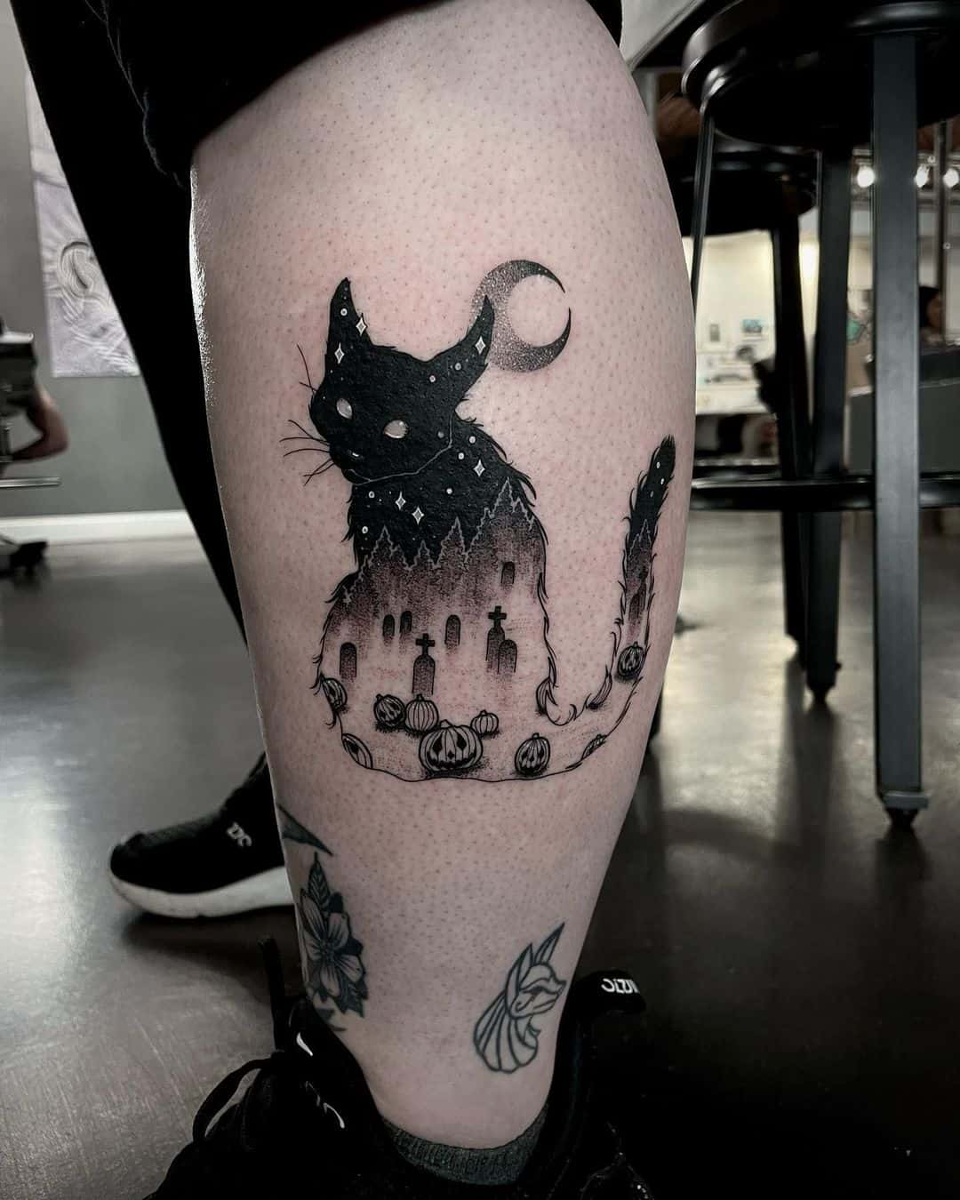 Black cat ith moon tattoo design by blvckmoon tattoo