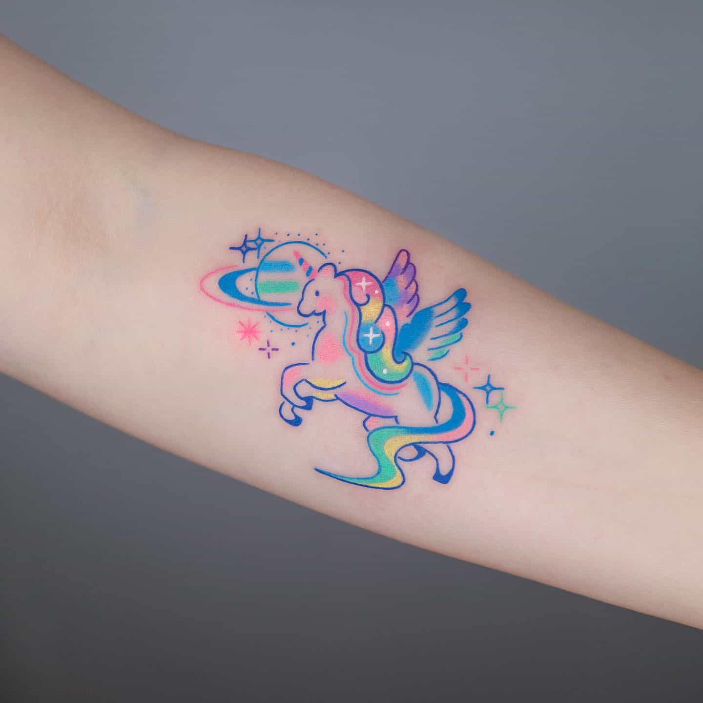 Colorful unicorn tattoo by u oooops