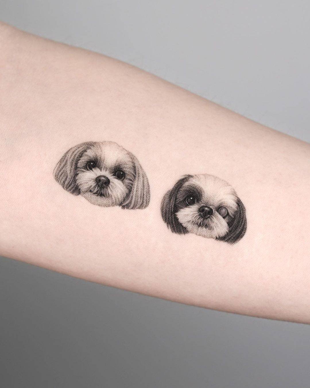 Cute multiple dog face tattoo by dorok.tattoo