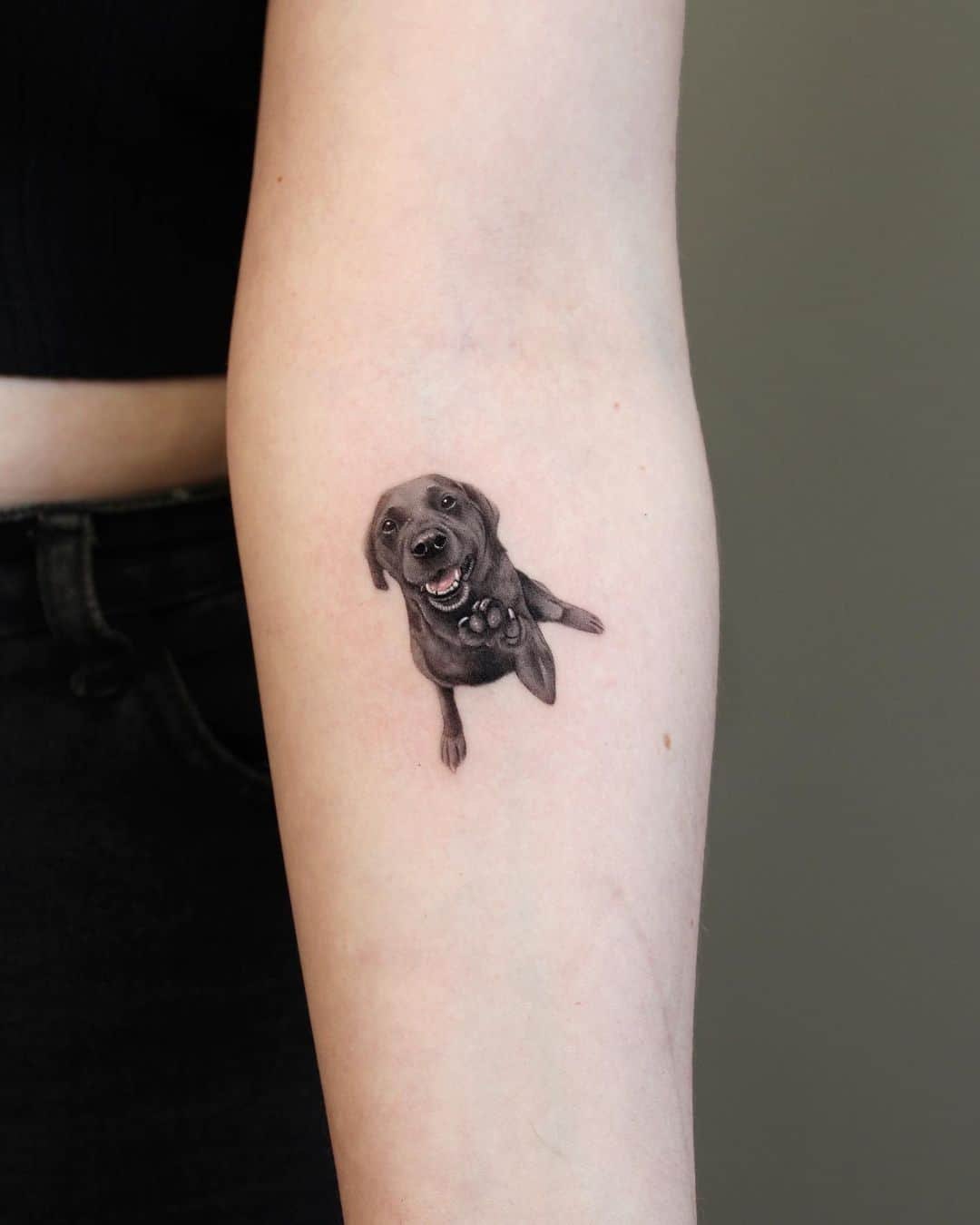 Cute reaistic dog tattoo by jiji tattoo