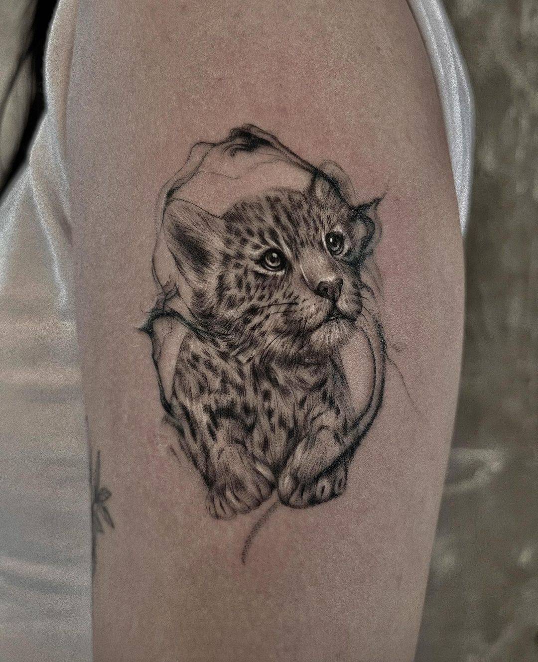 Cute small leoopard tattoo by pov tattoo