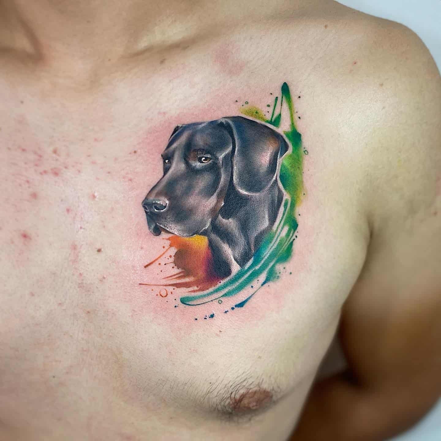 Dog tattoo on chest by dd tattoo atelier