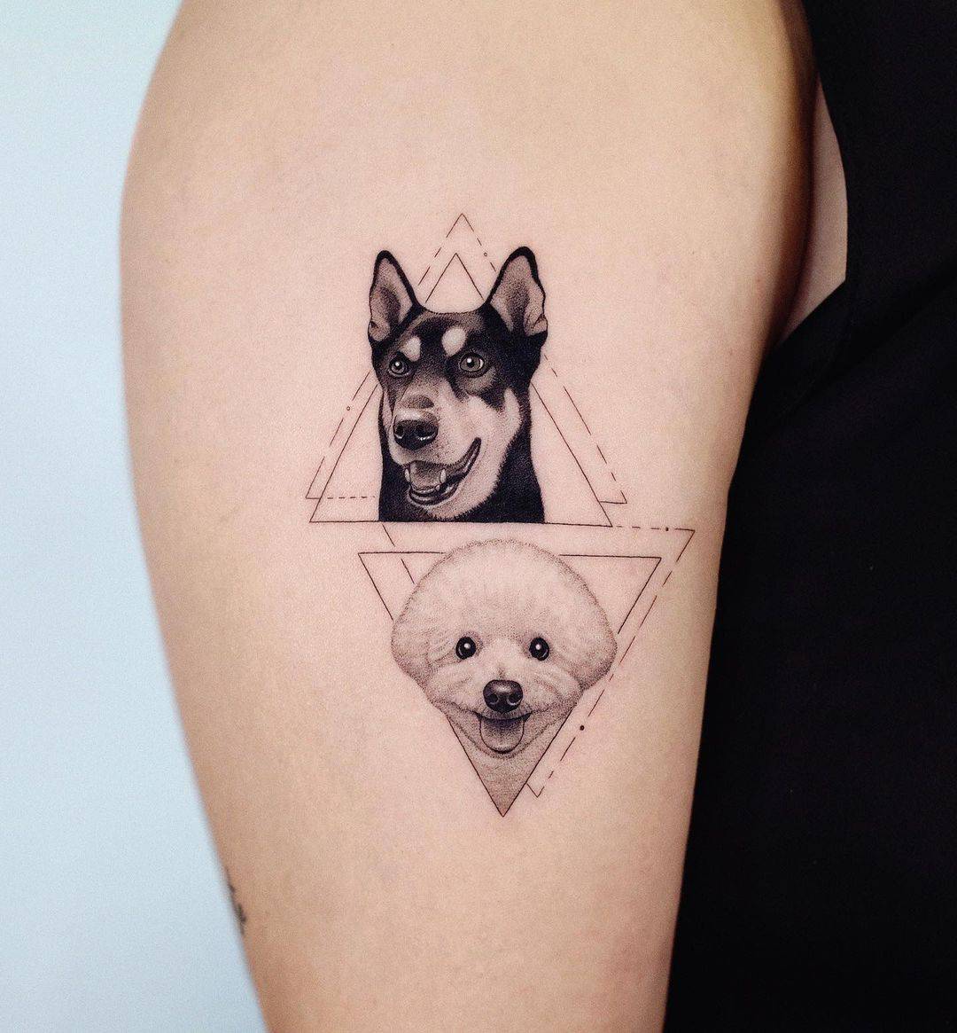 Dogs tattoo in geometric shape by zeal tattoo