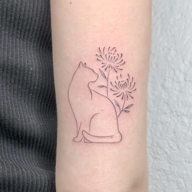 Fineline cat with flower tattoo by pauletteceyrat