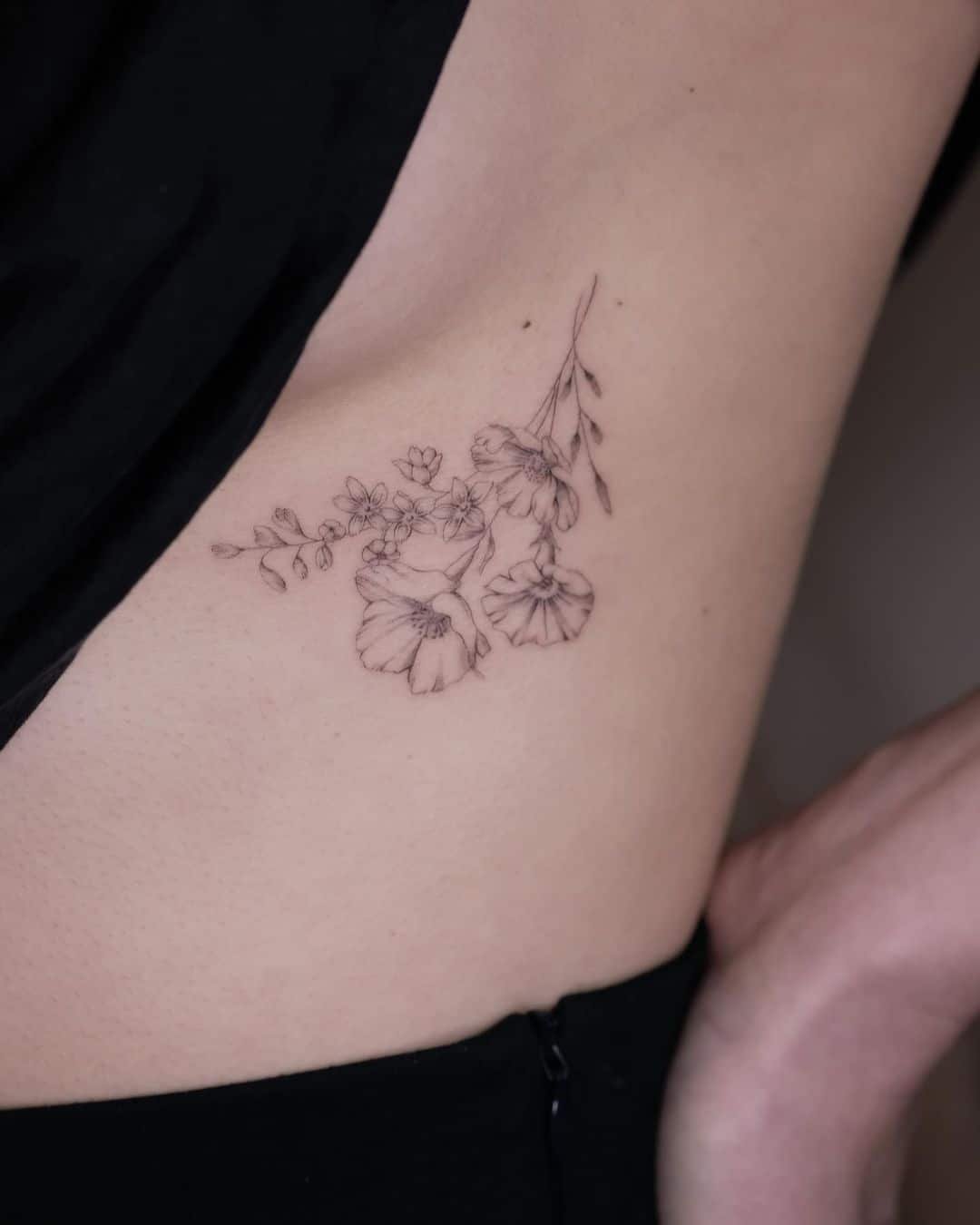 Fineline flower tattoo by alice adore ink