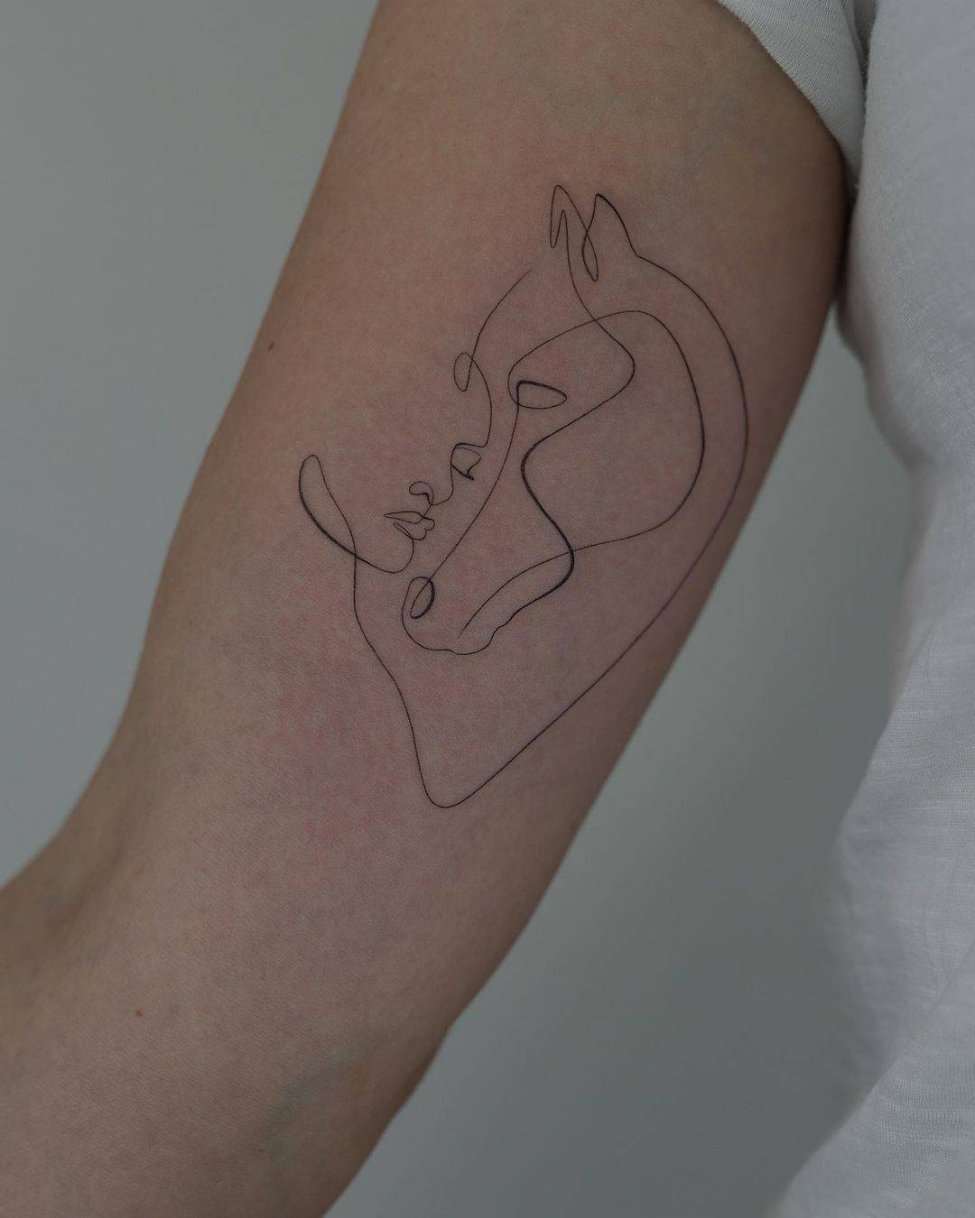 Fineline horse design by akkurat tattoo
